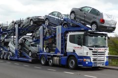 loaded car transporter truck